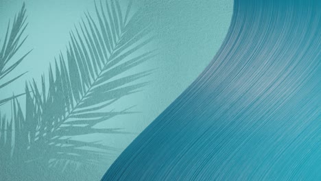 palm leaves shadow on blue background wall with copy space