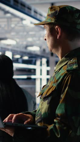 Vertical Video Military Soldier And Engineer In Server Room Use Ai Tools