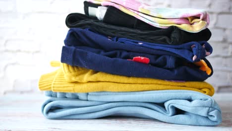 stack of colorful folded clothes