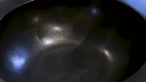 sprinkling powder into a tub preparation for a refreshing foot bath at the beauty salon