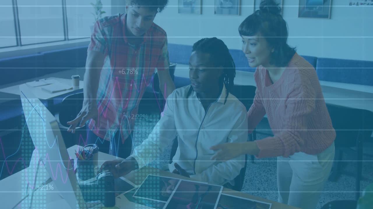 Analyzing data with financial graphs, business team collaborating in modern office