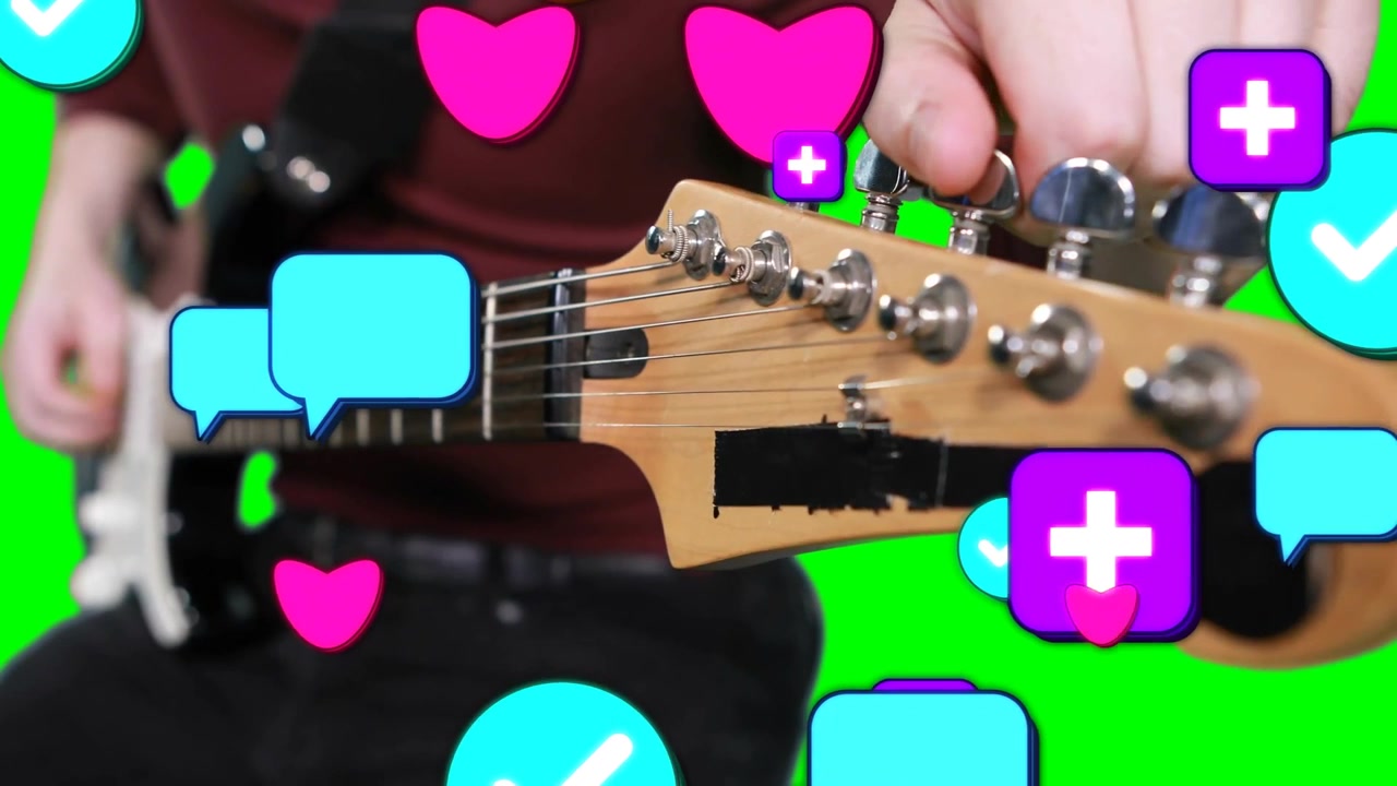 Tuning guitarist in red top and black strap adjusting headstock at green screen, floating icons