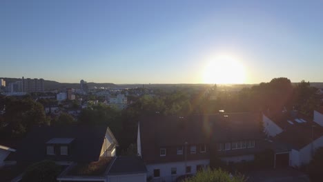 Flight-over-german-small-town-starting-from-the-living-room