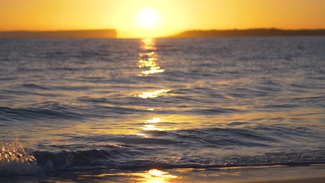 sunrise over australian beach and waves