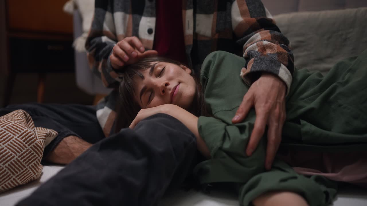 Affectionate Couple Relaxing at Home