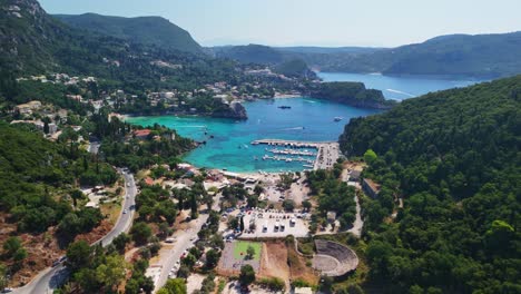 scenic aerial view of lush green coastline meeting a vibrant beach resort