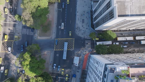 Sped-up-aerial-top-down-footage-of-a-traffic-intersection-in-Botafogo-beach-in-Rio-de-Janeiro