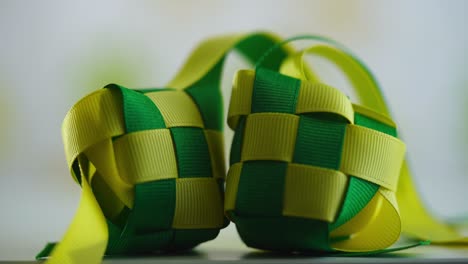 selective focus of ribbon ketupat against defocused light