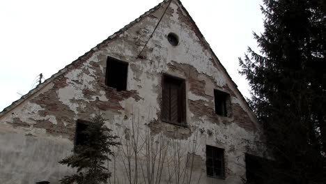 medium shot of abandoned farm or farmhouse in bavaria, germany