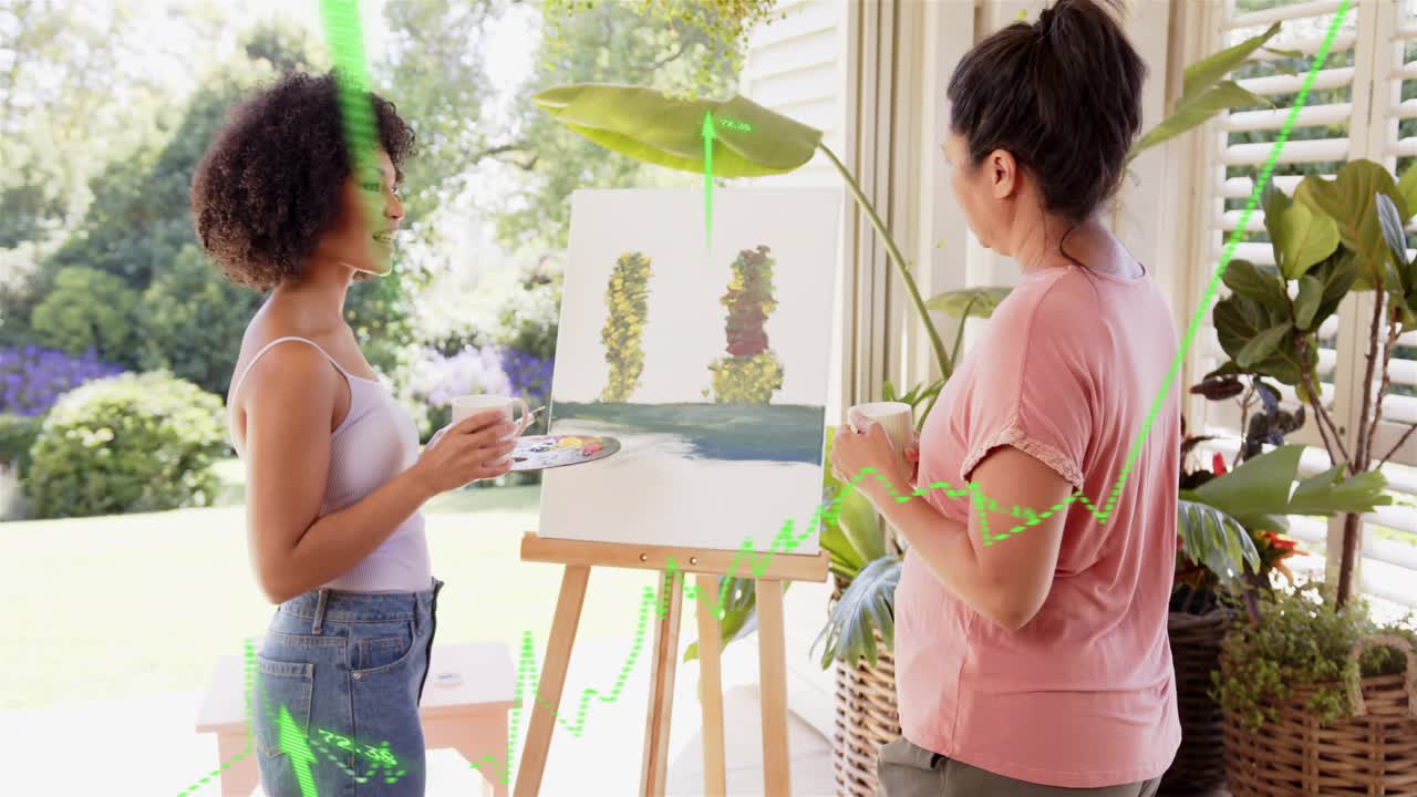 Left woman passing brush painting canvas mentor guiding art lesson porch green chart overlaying