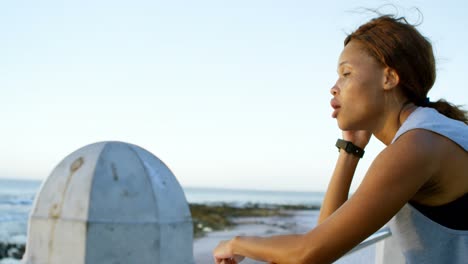 tired woman standing near beach 4k