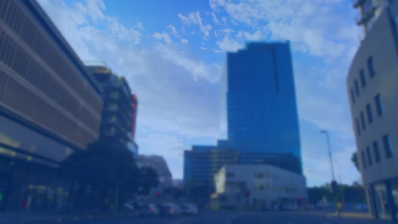 Glass reflecting blue tower showing red line appearing as red or blue chart oscillating showing mark