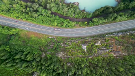 Aerial-topdown-of-Trans-Canada-Highway,-Railroad-and-Howe-Sound-Coastline,-Squamish,-BC,-Canada