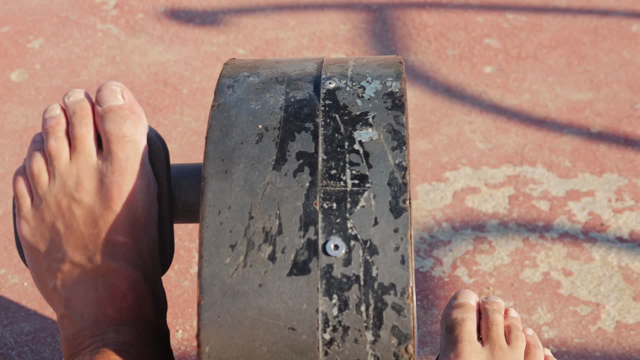Barefoot Exercise on an Outdoor Wheel