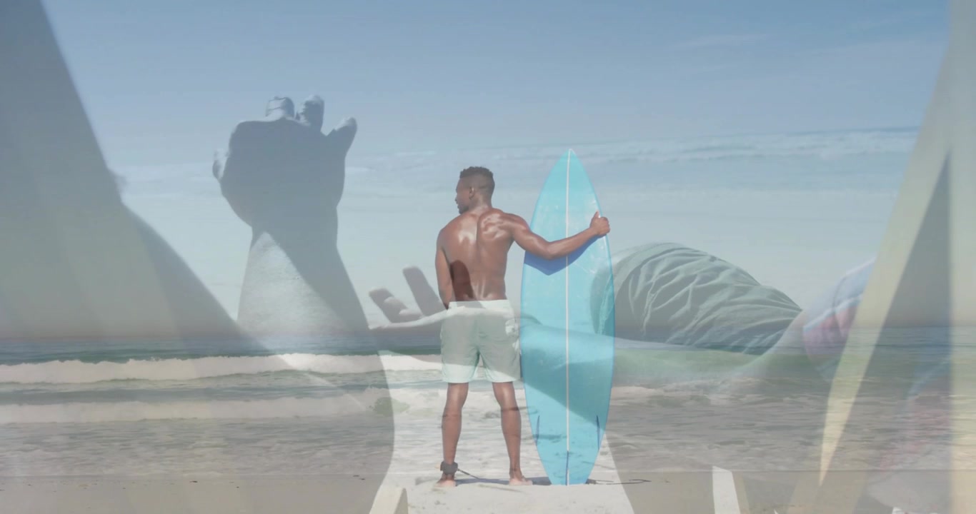 Surfer standing with board as clip progressing faint hands layering surfer and ocean preparing surf