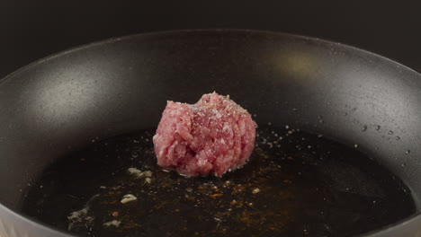 cooking ground beef in a pan
