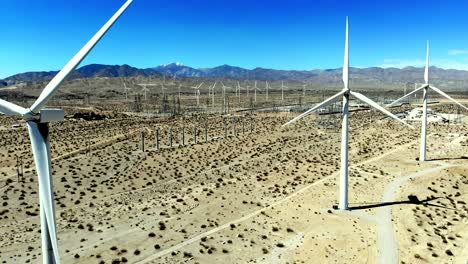 incredible, close-up windmills, wind turbines energy, green, renewable, power generating farm, aerial 4k drone right to left shot, mt