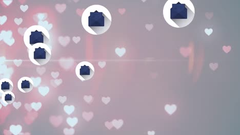 Multiple-message-icons-floating-over-multiple-glowing-heart-icons-against-red-background