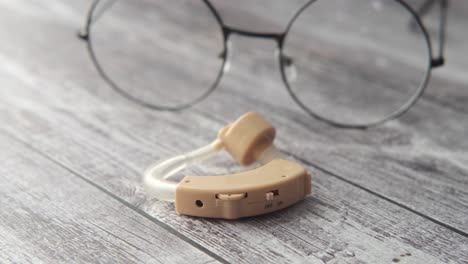 hearing aid and glasses