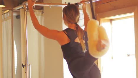 Woman-performing-stretching-exercise