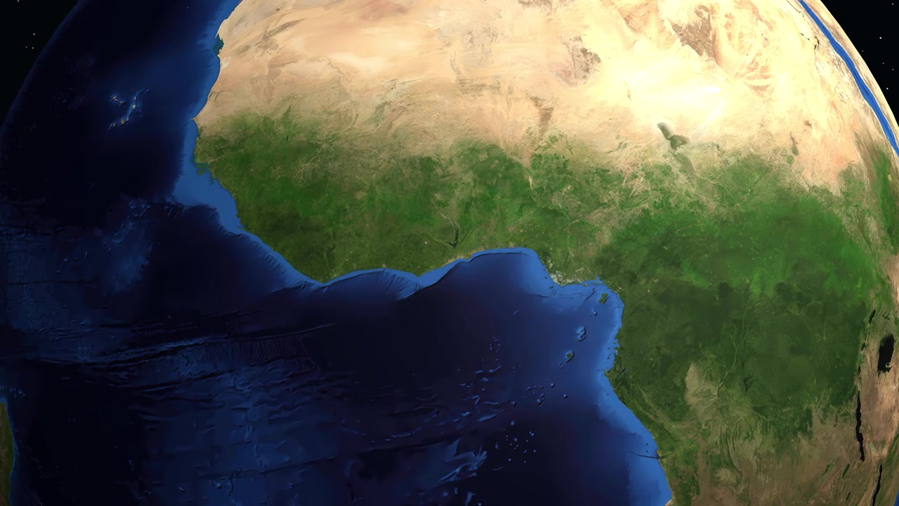 Un globo digitale ruota e si ingrandisce sull'Africa occidentale, individuando Koforidua con testo informativo.