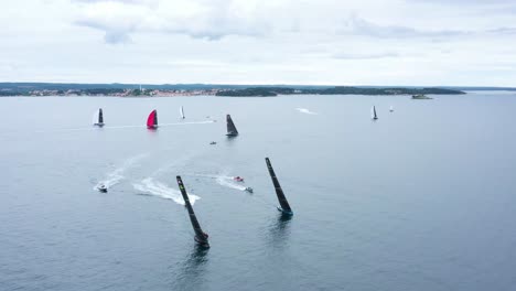 race sailboats sailing in regatta rc44 rovinj croatia - aerial drone view