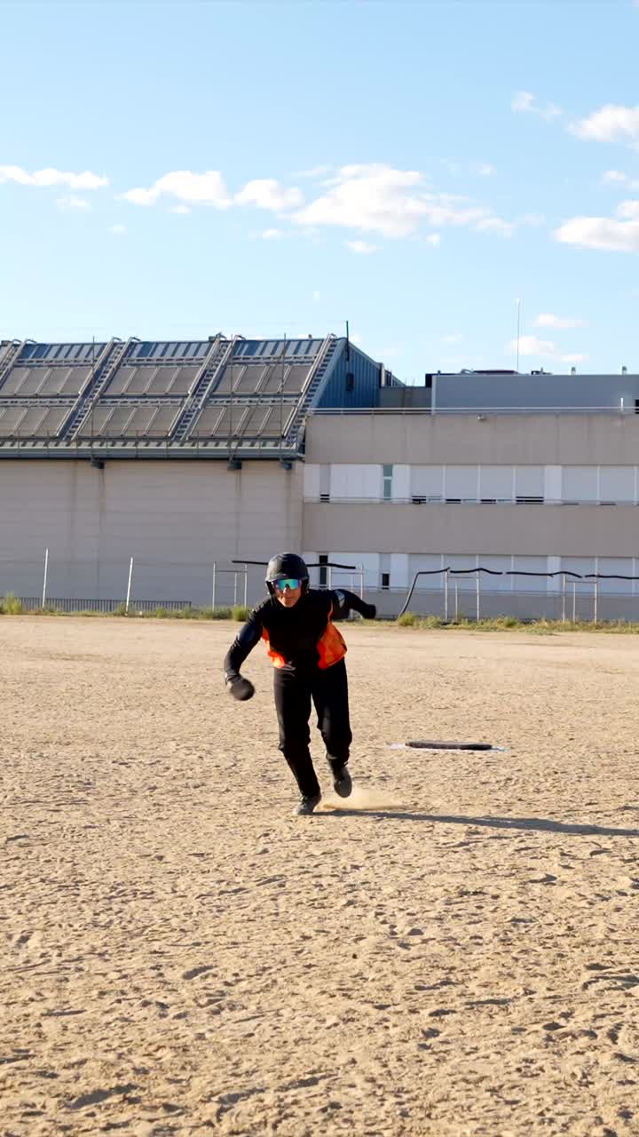 Baseball player sliding into base