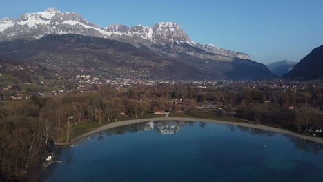 Drone-footage-descending-over-Lake-Passy-near-the-village-of-Passy-in-the-commune-of-Sallanches-near-the-heart-of-France's-Mont-Blanc-valley