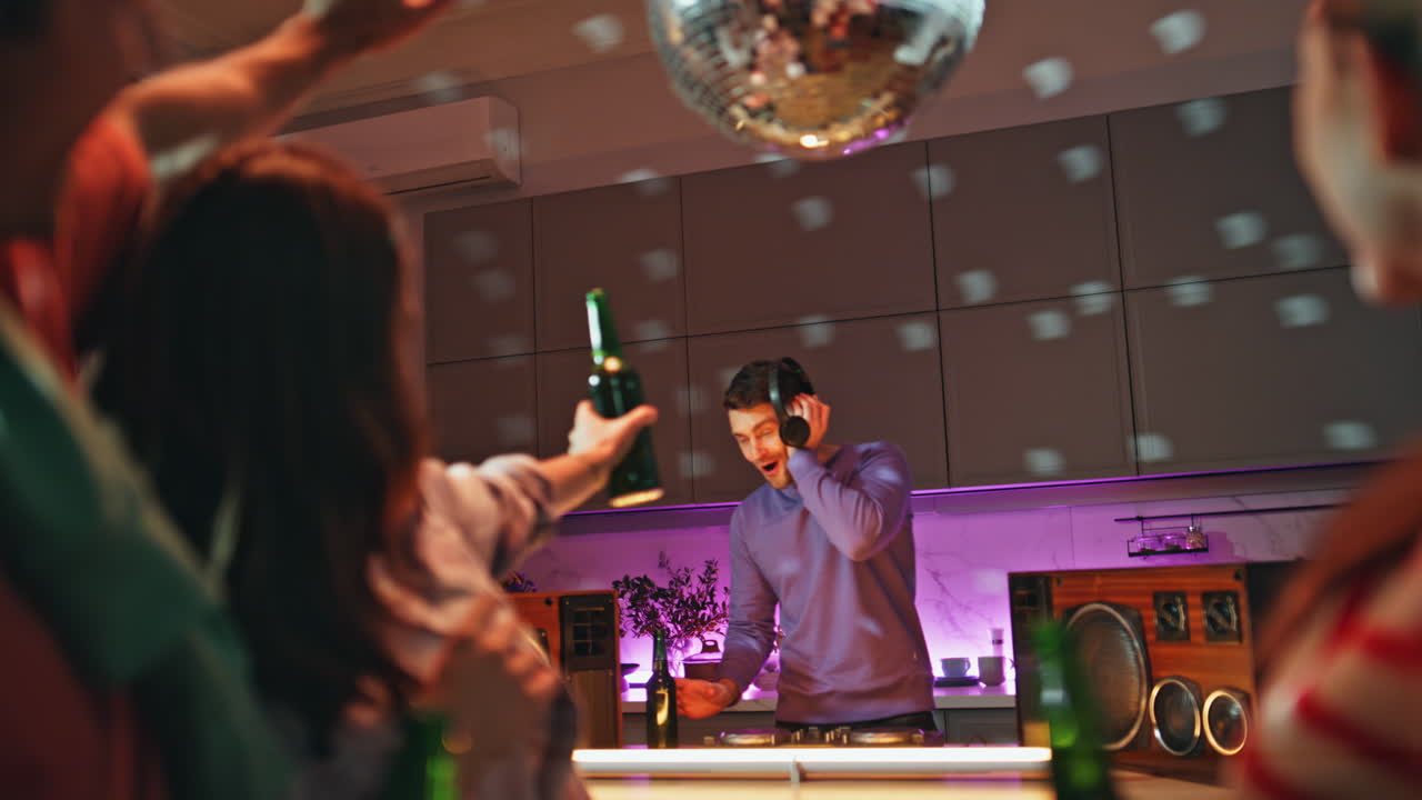 Disco friends having fun together at home party close up. Smiling people talking