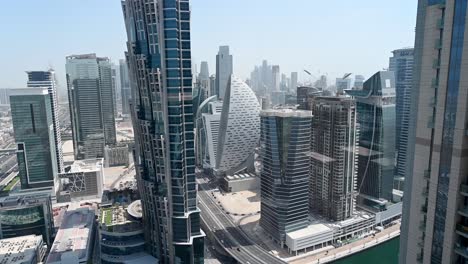 4k: cityscape skyscrapers of dubai business bay district with modern buildings, with burj khalifa view