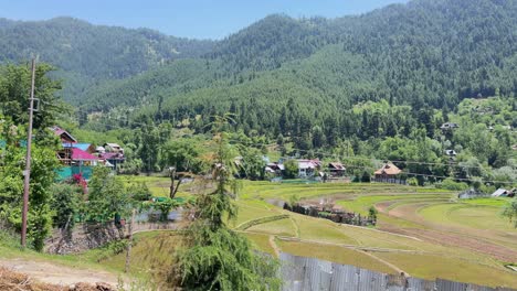 beauty of rural india and farmers land, nature beauty, hills, green fields with village life in forest area and timeless travel escapes