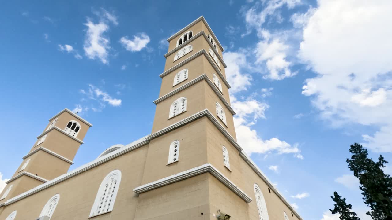 Looking Up At New Agios Pavlos Church Against Blue Sky In Agios Dometios, Cyprus. Low Angle Shot