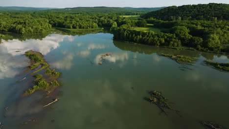 Sky-Reflecting-On-Tranquil-Waters-Of-Lake-Sequoyah-In-Arkansas,-USA---aerial-shot