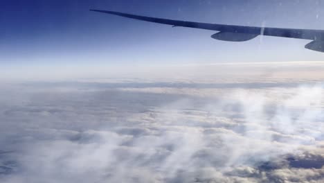 Flying-over-Newfoundland-and-Labrador-Canadian-territory-with-air-trail-of-condensation-due-to-cold-temperature-Aerial-view