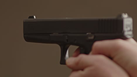 glock 17 being fired by man