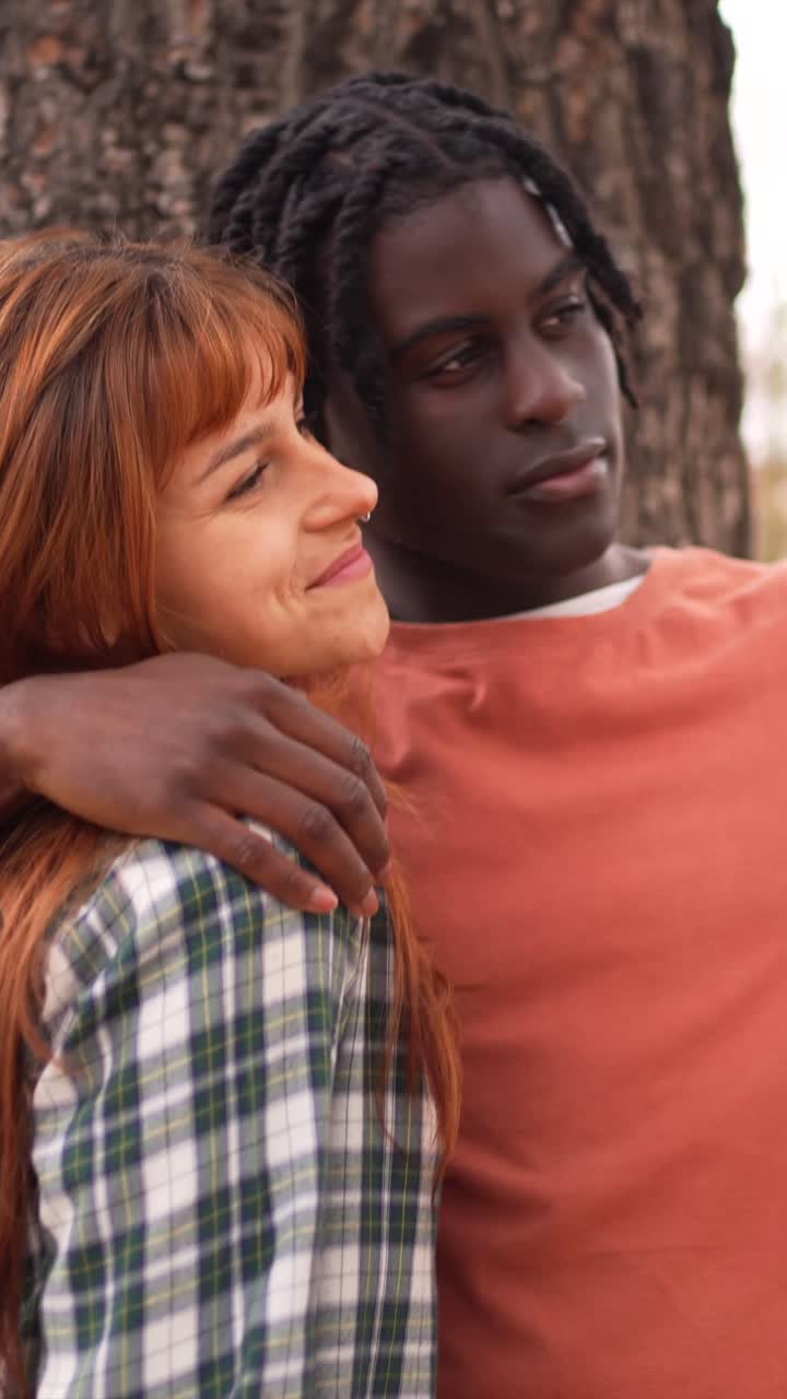 An interracial couple sharing a moment of affection