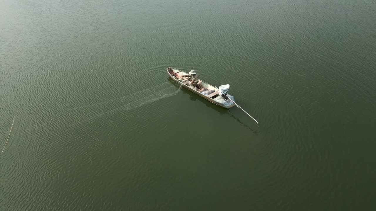 Fisherman Fishing in a Boat