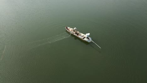 fisherman fishing in a boat
