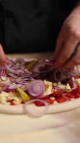 chef preparing a pizza