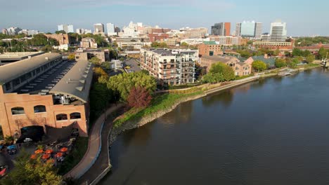 cinematic afternoon drone flyover from christina river to wilmington delaware skyline