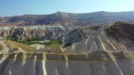 Flight-above-Cappadocia-landscape,-forward-aerial