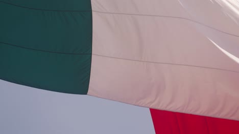 flag of mexico waving on windy day, close up slow motion view