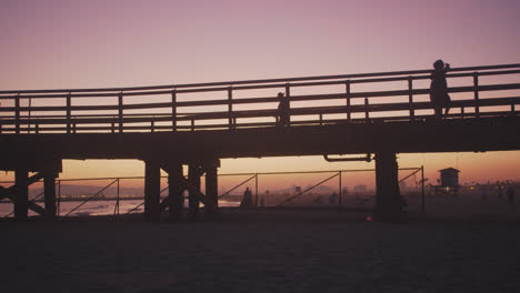 Pink-skies-and-silhouettes-at-the-Seal-Beach-pier