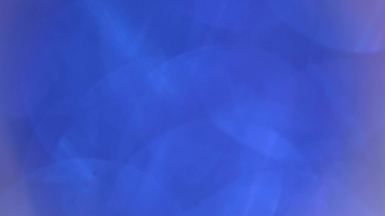 partículas de chispas abstractas que se mueven pequeñas grandes desenfocadas