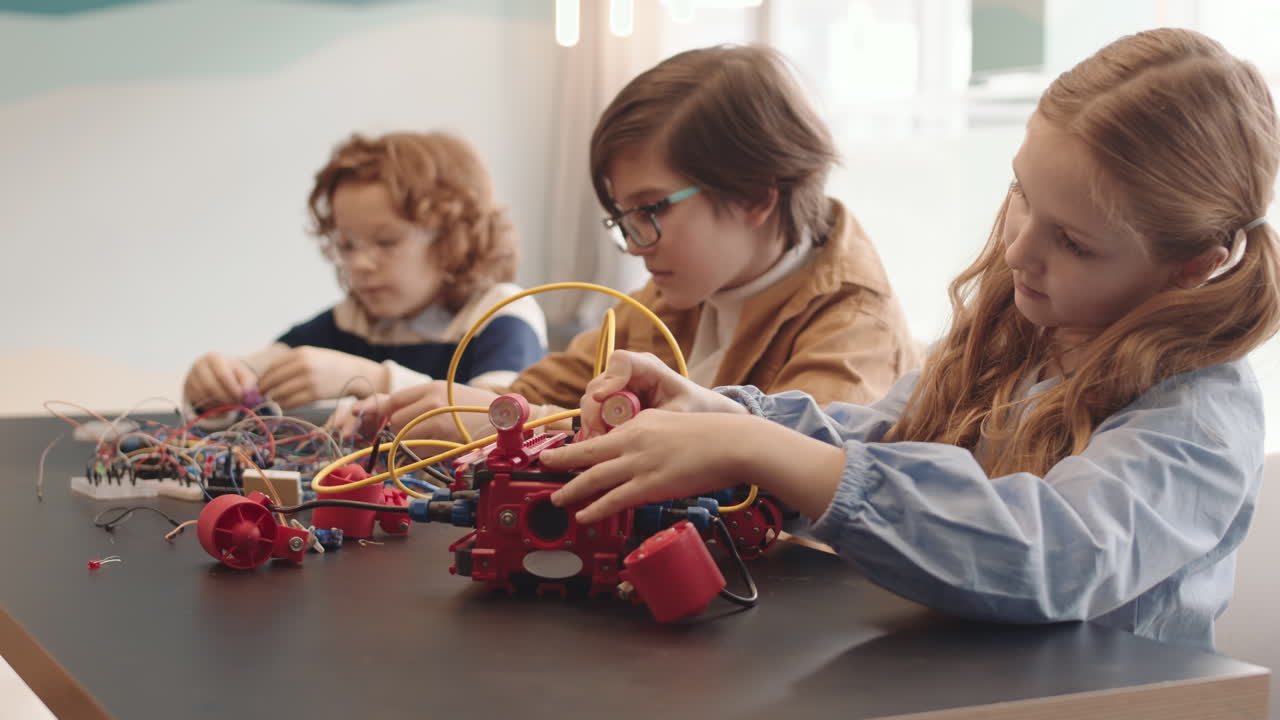 Children building robots in a STEM class