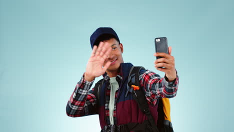 backpack, travel and video call by man in studio
