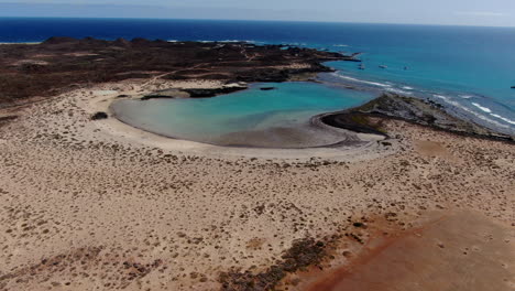 Aerial-shot-of-La-Concha-beach-on-Lobos-Island