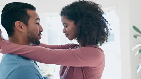 Smile,-dance-and-young-couple-at-their-home