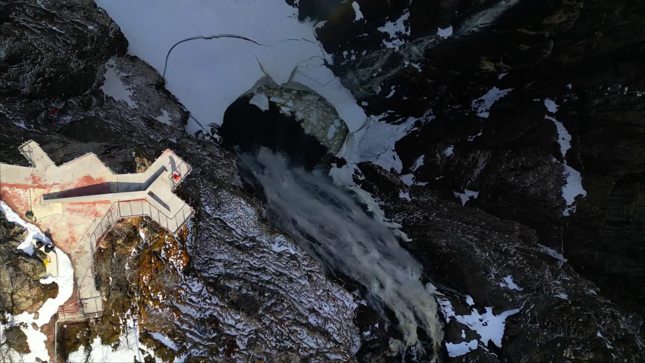Aerial View of Frozen Waterfall in Winter