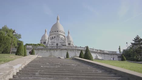 steps leading up to exterior of sacre coeur church in paris france shot in slow motion